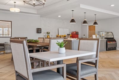 Bright dining area with modern decor and seating