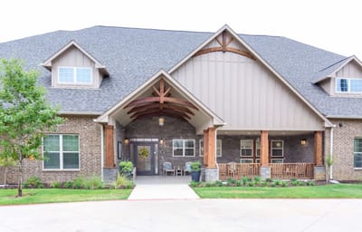 Exterior view of the facility entrance with landscaping