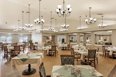 Dining room with tables set for meals