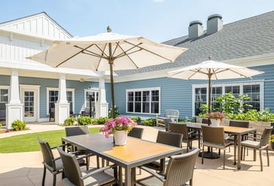 Outdoor seating area with umbrellas and flowers