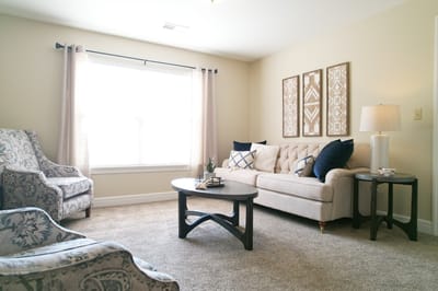 Bright interior seating area with a cozy couch
