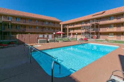 Swimming pool surrounded by residential units