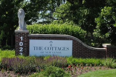 Exterior view of The Cottages of New Lenox entrance sign