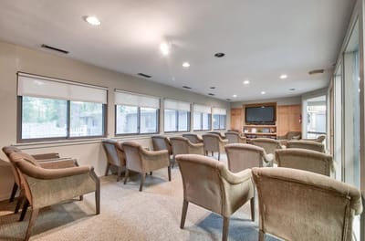 Bright common area with seating chairs arranged