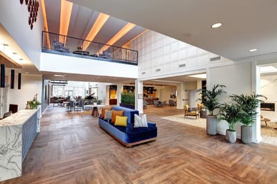 Bright lobby with modern decor and seating area