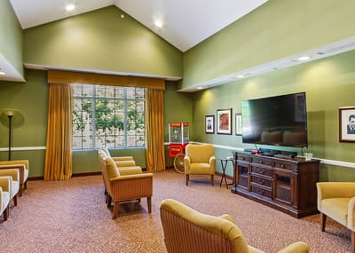 Common area with seating and television