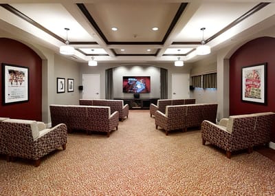 Comfortable seating in a common area with TV