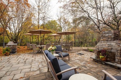 Outdoor patio area with seating and fire pit