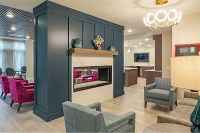Bright common area with seating and modern decor