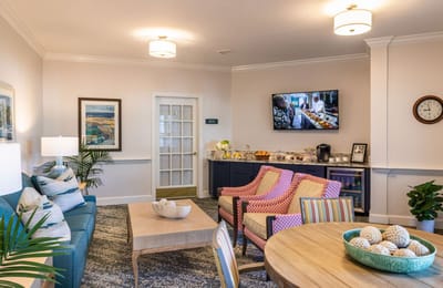 Cozy common area with seating and television