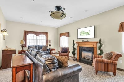 Comfortable common area with seating and fireplace