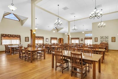 Bright dining room with wooden tables and chairs