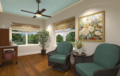 Bright common area with green chairs and flower painting