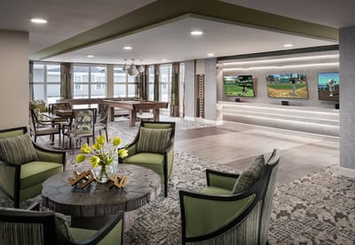 Bright common area with seating and entertainment options