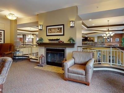Cozy common area with a fireplace and seating