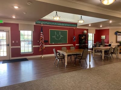 Bright common area with tables and chairs