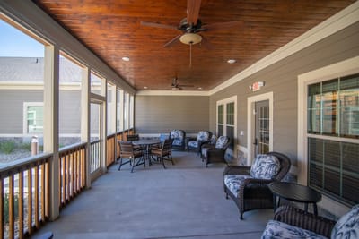 Outdoor seating area with comfortable chairs and tables
