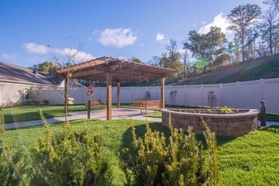 Outdoor pergola area in a senior living facility