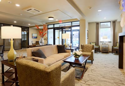 Interior lounge area with sofas and natural lighting