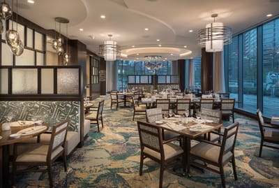 Elegant dining room with modern decor and ample seating