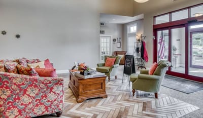 Bright lobby area with comfortable seating and decor