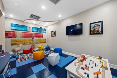Bright activity room for residents with colorful decor