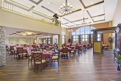 Spacious dining room with elegantly set tables