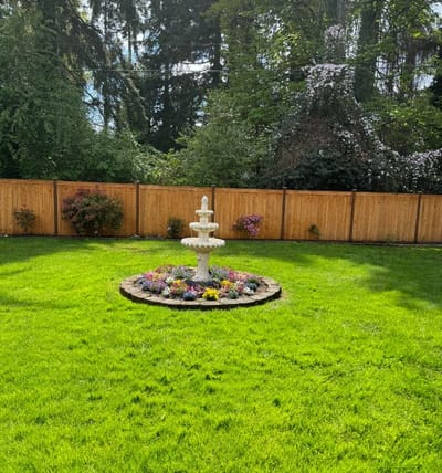 Scenic garden with a fountain and flowers
