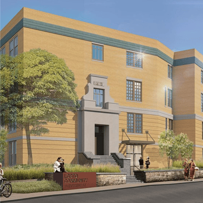 Exterior view of a senior living facility with landscaping
