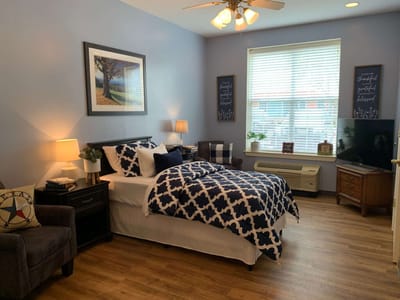 Cozy resident room with bed and furnishings