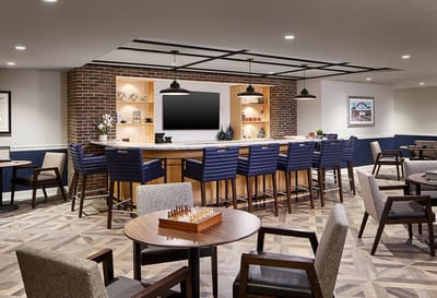 Common area with seating and a bar
