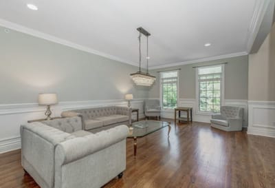 Bright common area with elegant seating and natural light