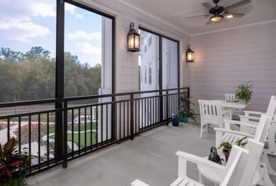 Outdoor seating area overlooking landscaped grounds