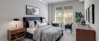 Well-decorated private resident room with natural light