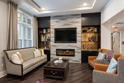 Cozy common area with comfortable seating and TV