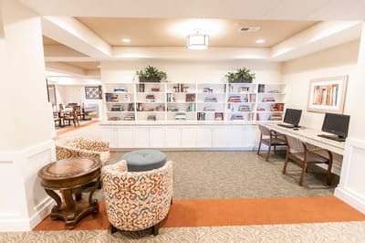 Common area with seating and a book shelf