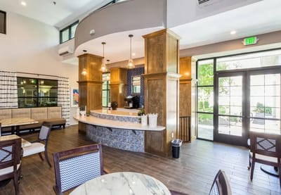 Bright lobby area with seating and reception.