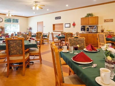 Dining room setup with tables and meals served