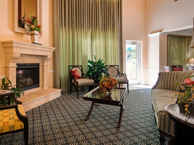 Cozy common area with seating and fireplace