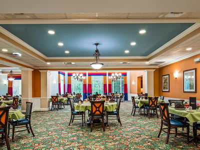 Dining room with tables set for meals