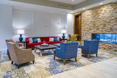 Bright and inviting common area with seating and decor