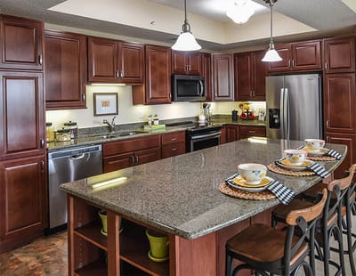 Modern kitchen with wooden cabinets and island