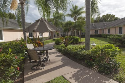 Pathway with seating area in a landscaped garden