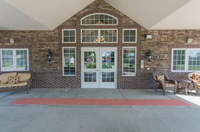 Entrance of Villas of Holly Brook Effingham featuring outdoor seating
