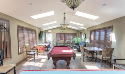 Interior view of a common area with a pool table