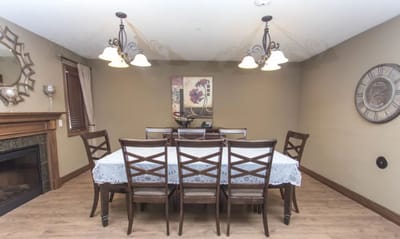 Dining room with wooden table and chairs