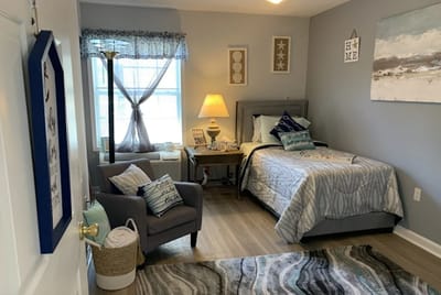 Cozy resident room with a bed and decor