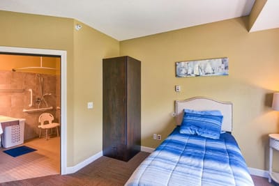 Cozy resident room with bathroom accessibility features