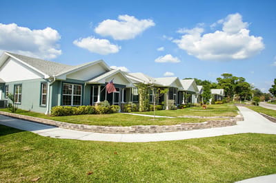 Residential buildings in a senior living community with landscaping