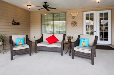 Cozy outdoor seating area with decorative cushions